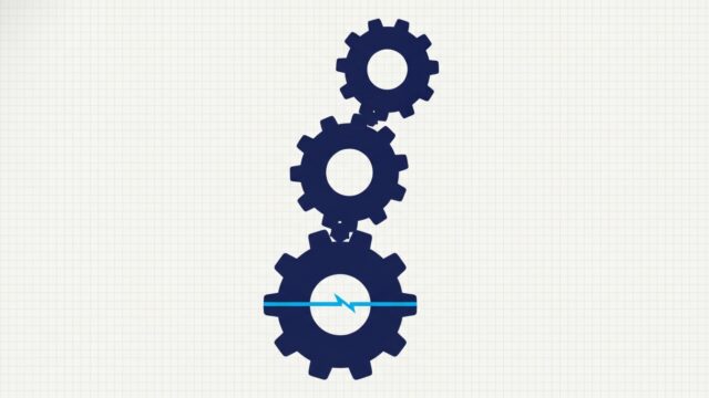 A leaning tower of large solid interlocking gears with the lowest one split by a single crack